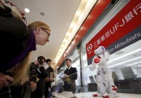 Polyglot humanoid robot greets customers at Tokyo airport