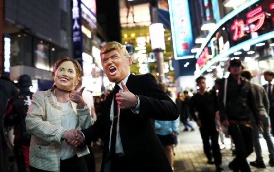 Clinton embraces Trump in grisly Japan Halloween